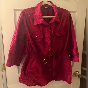 Magenta blouse with gold accents.